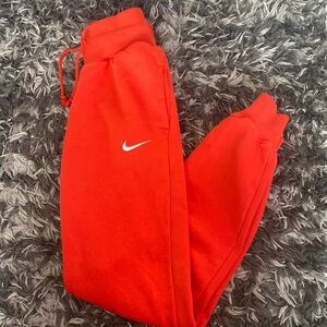 Brand new- no tags. XXS orange Nike sweatpants jogger style